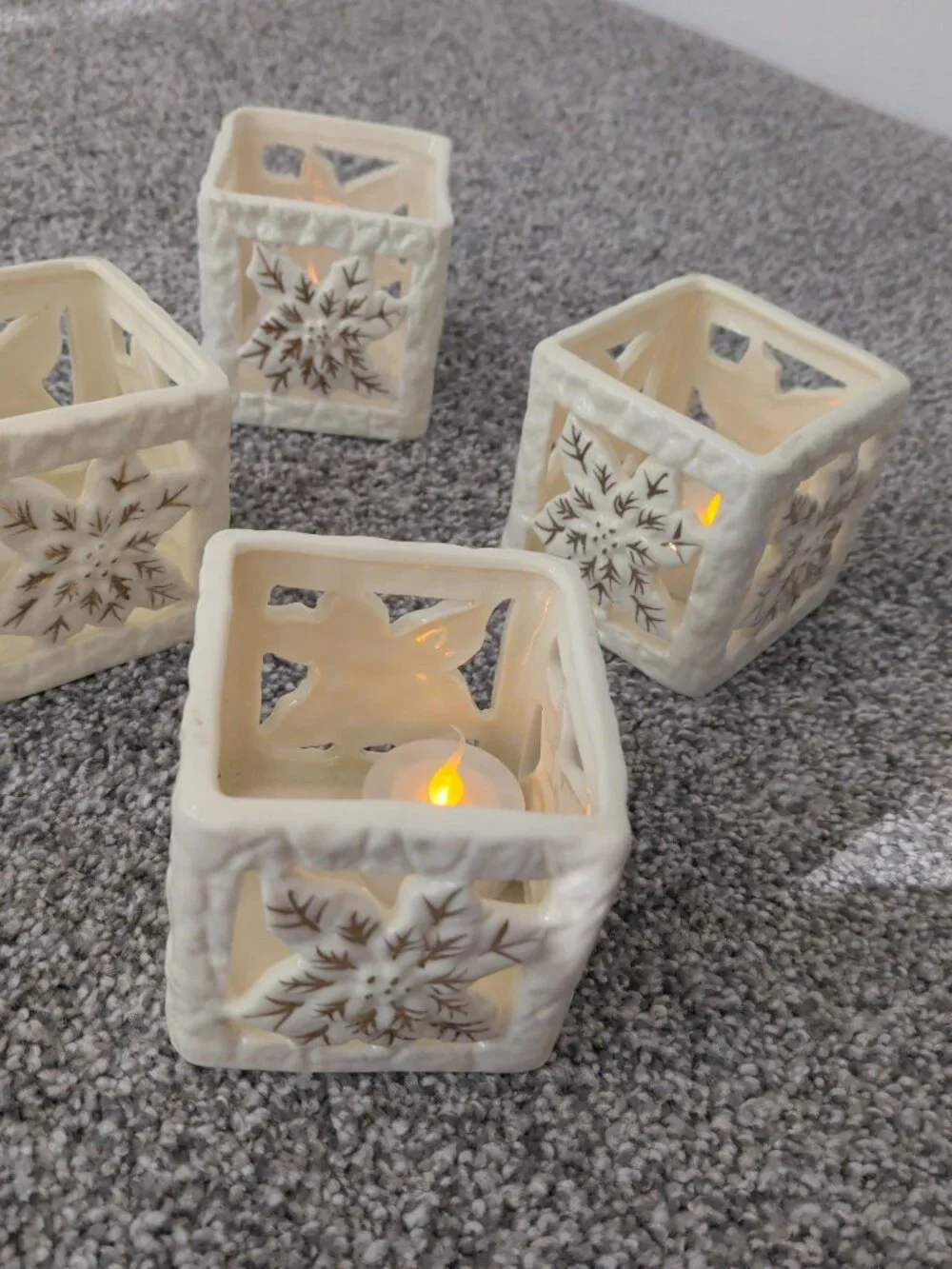 Set of 4 Cream Ceramic Pierced Poinsettia Tea Light Lanterns + 4 LED Candles